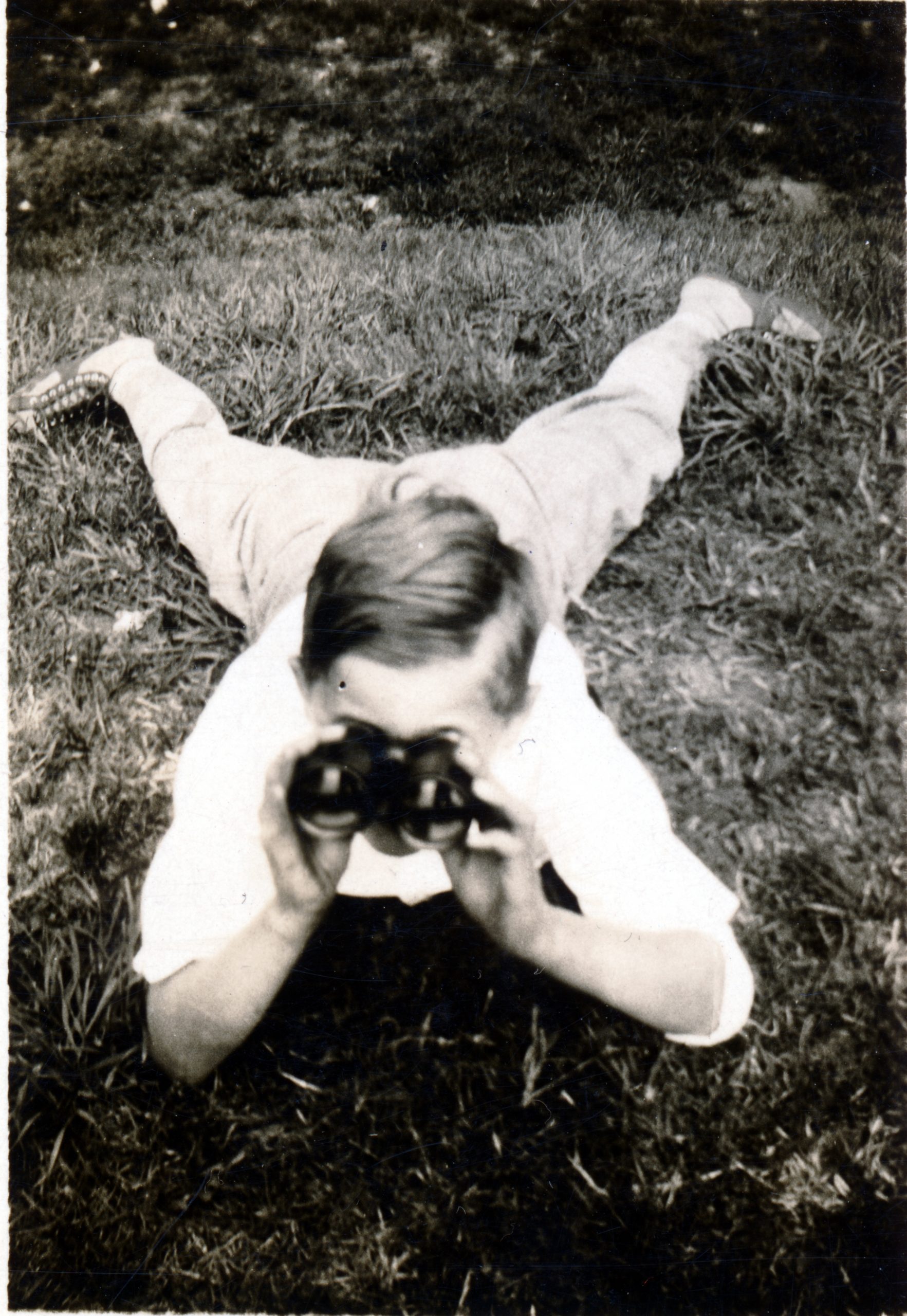 a photo of Bill Weber looking at birds in the Bronx, New York